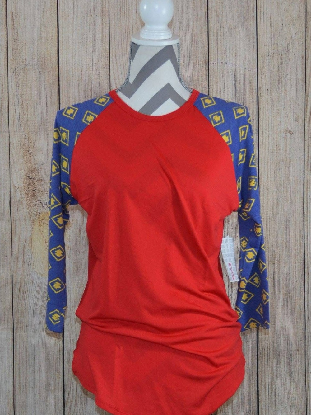 LuLaRoe Randy Red Raglan Tee with Blue and Yellow Geometric Sleeves